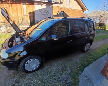 Черный Фольксваген Туран, объемом двигателя 1.9 л и пробегом 419 тыс. км за 4700 $, фото 1 на Automoto.ua