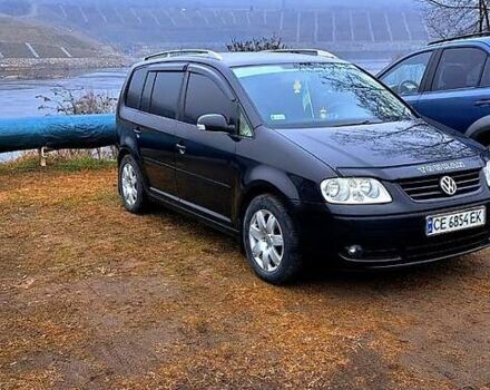Черный Фольксваген Туран, объемом двигателя 1.9 л и пробегом 385 тыс. км за 5800 $, фото 12 на Automoto.ua