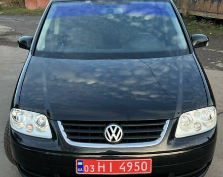 Черный Фольксваген Туран, объемом двигателя 1.6 л и пробегом 229 тыс. км за 6450 $, фото 3 на Automoto.ua