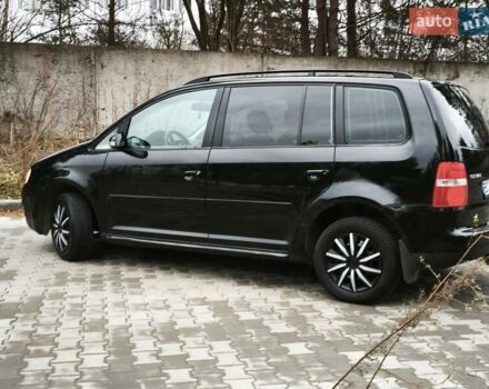 Черный Фольксваген Туран, объемом двигателя 2 л и пробегом 321 тыс. км за 5500 $, фото 6 на Automoto.ua