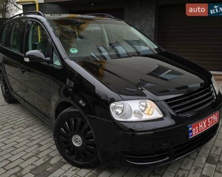 Черный Фольксваген Туран, объемом двигателя 1.6 л и пробегом 219 тыс. км за 5399 $, фото 13 на Automoto.ua