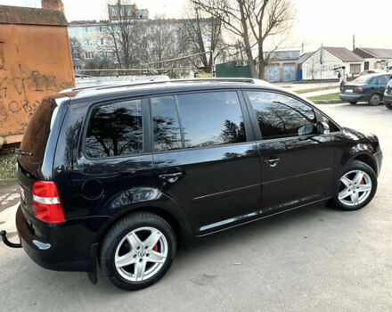 Черный Фольксваген Туран, объемом двигателя 1.6 л и пробегом 229 тыс. км за 6450 $, фото 8 на Automoto.ua