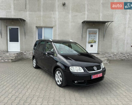 Черный Фольксваген Туран, объемом двигателя 1.98 л и пробегом 188 тыс. км за 4600 $, фото 1 на Automoto.ua