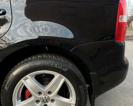 Черный Фольксваген Туран, объемом двигателя 1.6 л и пробегом 229 тыс. км за 6450 $, фото 19 на Automoto.ua
