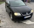 Черный Фольксваген Туран, объемом двигателя 1.6 л и пробегом 290 тыс. км за 4600 $, фото 1 на Automoto.ua