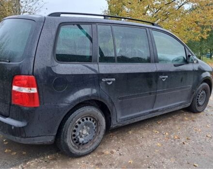 Черный Фольксваген Туран, объемом двигателя 1.6 л и пробегом 205 тыс. км за 5650 $, фото 5 на Automoto.ua