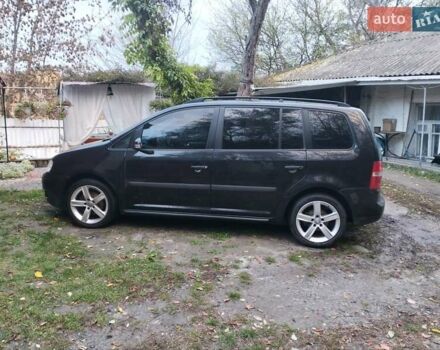 Черный Фольксваген Туран, объемом двигателя 1.9 л и пробегом 334 тыс. км за 5500 $, фото 7 на Automoto.ua