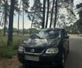 Чорний Фольксваген Туран, об'ємом двигуна 2 л та пробігом 263 тис. км за 4999 $, фото 1 на Automoto.ua
