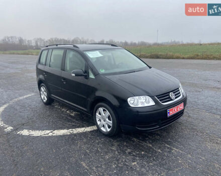 Черный Фольксваген Туран, объемом двигателя 1.6 л и пробегом 198 тыс. км за 6800 $, фото 5 на Automoto.ua