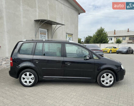 Черный Фольксваген Туран, объемом двигателя 1.98 л и пробегом 188 тыс. км за 4600 $, фото 20 на Automoto.ua