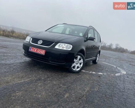 Черный Фольксваген Туран, объемом двигателя 1.6 л и пробегом 198 тыс. км за 6800 $, фото 3 на Automoto.ua