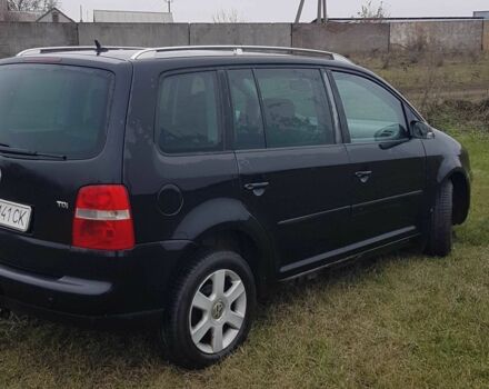Черный Фольксваген Туран, объемом двигателя 2 л и пробегом 224 тыс. км за 4500 $, фото 5 на Automoto.ua