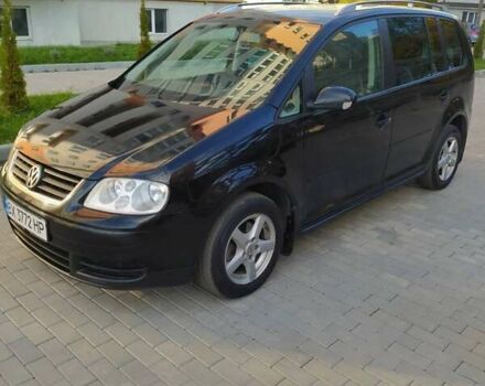 Черный Фольксваген Туран, объемом двигателя 1.6 л и пробегом 283 тыс. км за 5200 $, фото 8 на Automoto.ua