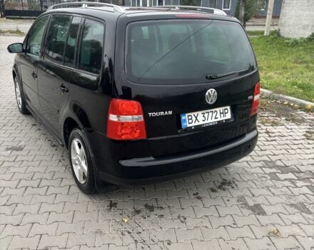 Черный Фольксваген Туран, объемом двигателя 1.6 л и пробегом 290 тыс. км за 4600 $, фото 3 на Automoto.ua