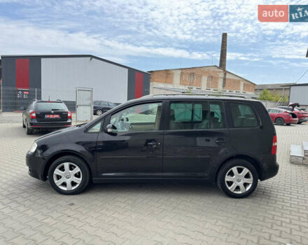 Черный Фольксваген Туран, объемом двигателя 1.98 л и пробегом 188 тыс. км за 4600 $, фото 6 на Automoto.ua