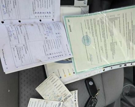 Черный Фольксваген Туран, объемом двигателя 1.6 л и пробегом 219 тыс. км за 5399 $, фото 38 на Automoto.ua