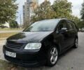 Чорний Фольксваген Туран, об'ємом двигуна 1.9 л та пробігом 300 тис. км за 3251 $, фото 1 на Automoto.ua
