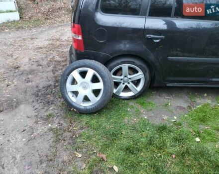 Черный Фольксваген Туран, объемом двигателя 1.9 л и пробегом 334 тыс. км за 5500 $, фото 9 на Automoto.ua