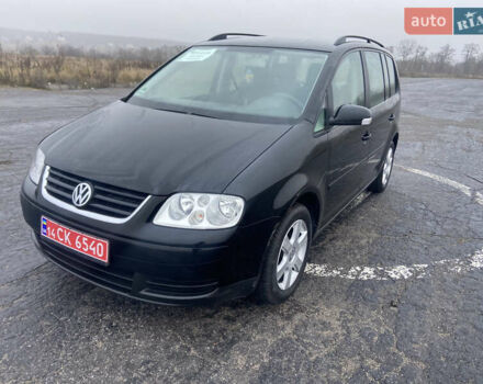 Черный Фольксваген Туран, объемом двигателя 1.6 л и пробегом 198 тыс. км за 6800 $, фото 2 на Automoto.ua