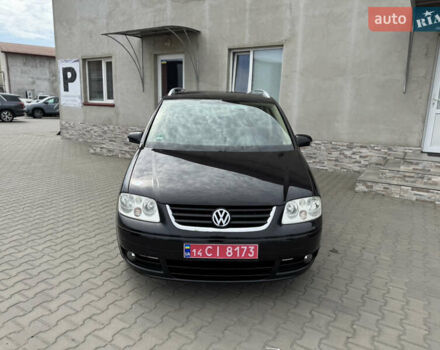 Черный Фольксваген Туран, объемом двигателя 1.98 л и пробегом 188 тыс. км за 4600 $, фото 3 на Automoto.ua