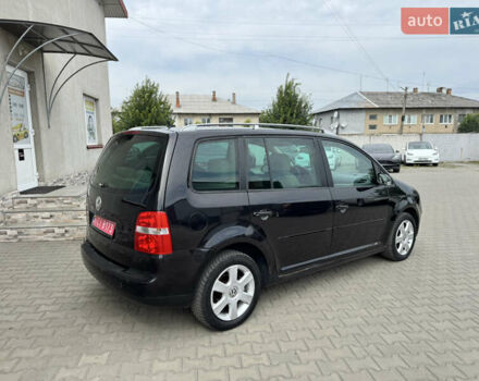 Черный Фольксваген Туран, объемом двигателя 1.98 л и пробегом 188 тыс. км за 4600 $, фото 15 на Automoto.ua