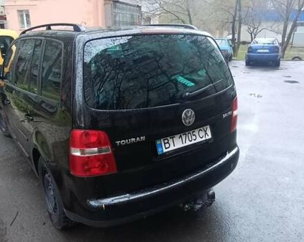 Черный Фольксваген Туран, объемом двигателя 1.97 л и пробегом 243 тыс. км за 6400 $, фото 7 на Automoto.ua