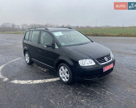 Черный Фольксваген Туран, объемом двигателя 1.6 л и пробегом 198 тыс. км за 6800 $, фото 6 на Automoto.ua