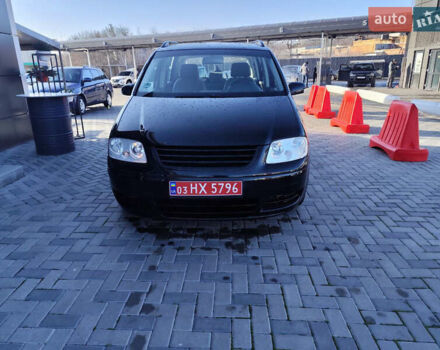 Черный Фольксваген Туран, объемом двигателя 1.6 л и пробегом 219 тыс. км за 5850 $, фото 3 на Automoto.ua