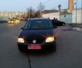Черный Фольксваген Туран, объемом двигателя 1.6 л и пробегом 210 тыс. км за 5850 $, фото 1 на Automoto.ua