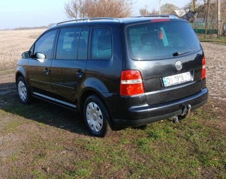 Черный Фольксваген Туран, объемом двигателя 2 л и пробегом 290 тыс. км за 6000 $, фото 6 на Automoto.ua