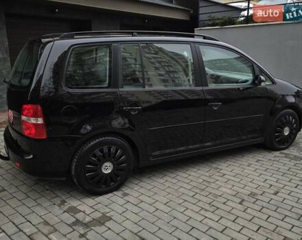Черный Фольксваген Туран, объемом двигателя 1.6 л и пробегом 219 тыс. км за 5399 $, фото 10 на Automoto.ua
