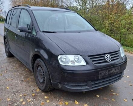 Черный Фольксваген Туран, объемом двигателя 1.6 л и пробегом 205 тыс. км за 5650 $, фото 7 на Automoto.ua