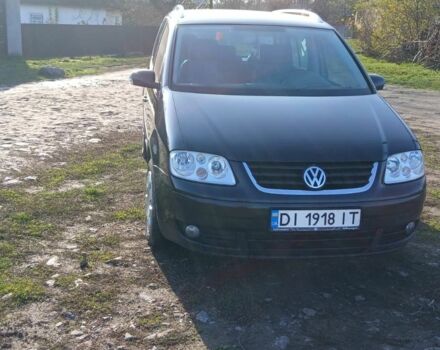 Черный Фольксваген Туран, объемом двигателя 2 л и пробегом 290 тыс. км за 6000 $, фото 7 на Automoto.ua