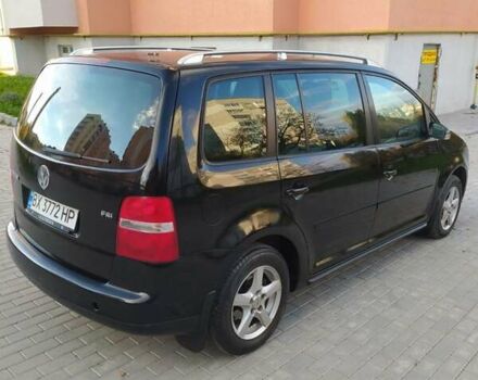 Черный Фольксваген Туран, объемом двигателя 1.6 л и пробегом 283 тыс. км за 5200 $, фото 17 на Automoto.ua