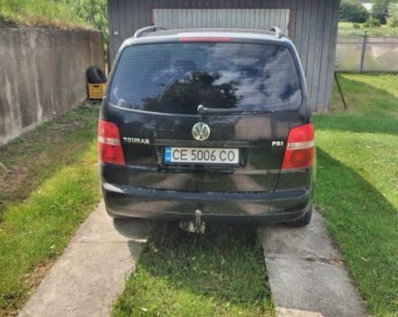 Черный Фольксваген Туран, объемом двигателя 1.6 л и пробегом 380 тыс. км за 5100 $, фото 3 на Automoto.ua