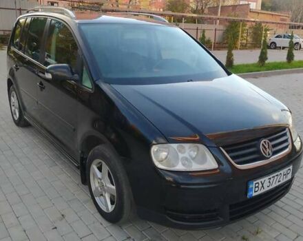 Черный Фольксваген Туран, объемом двигателя 1.6 л и пробегом 283 тыс. км за 5200 $, фото 4 на Automoto.ua