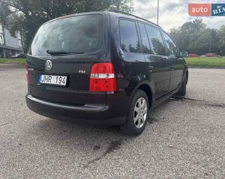 Фольксваген Туран 2005 в Житомире на Automoto.ua Черный Фольксваген Туран, объемом двигателя 1.6 л и пробегом 186 тыс. км за 6950 $, фото 2 на Automoto.ua