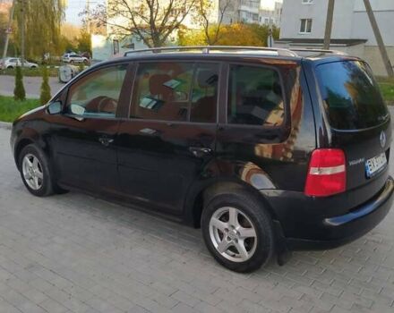 Черный Фольксваген Туран, объемом двигателя 1.6 л и пробегом 283 тыс. км за 5200 $, фото 14 на Automoto.ua