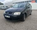 Фольксваген Туран 2005 в Житомире на Automoto.ua Черный Фольксваген Туран, объемом двигателя 1.6 л и пробегом 186 тыс. км за 6950 $, фото 1 на Automoto.ua