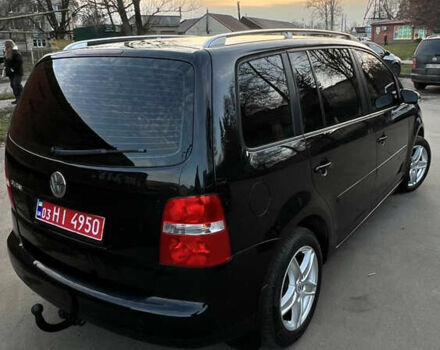 Черный Фольксваген Туран, объемом двигателя 1.6 л и пробегом 229 тыс. км за 6450 $, фото 9 на Automoto.ua