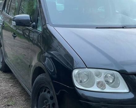 Черный Фольксваген Туран, объемом двигателя 1.97 л и пробегом 243 тыс. км за 6400 $, фото 4 на Automoto.ua