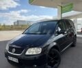 Черный Фольксваген Туран, объемом двигателя 0 л и пробегом 250 тыс. км за 3011 $, фото 1 на Automoto.ua