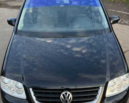 Черный Фольксваген Туран, объемом двигателя 1.6 л и пробегом 229 тыс. км за 6450 $, фото 4 на Automoto.ua