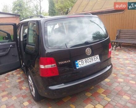 Черный Фольксваген Туран, объемом двигателя 1.6 л и пробегом 277 тыс. км за 6200 $, фото 1 на Automoto.ua