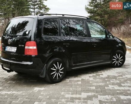 Черный Фольксваген Туран, объемом двигателя 2 л и пробегом 321 тыс. км за 5500 $, фото 8 на Automoto.ua