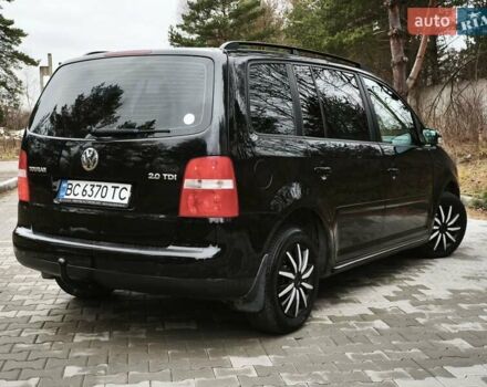 Черный Фольксваген Туран, объемом двигателя 2 л и пробегом 321 тыс. км за 5500 $, фото 11 на Automoto.ua