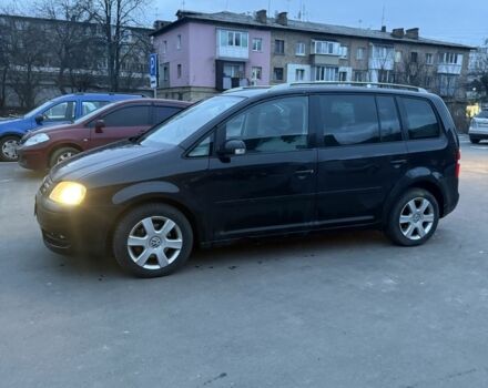 Черный Фольксваген Туран, объемом двигателя 2 л и пробегом 377 тыс. км за 2500 $, фото 7 на Automoto.ua