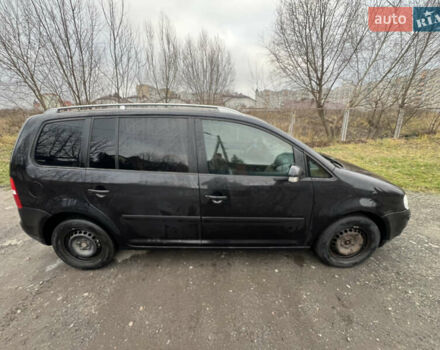 Черный Фольксваген Туран, объемом двигателя 1.6 л и пробегом 287 тыс. км за 4800 $, фото 7 на Automoto.ua