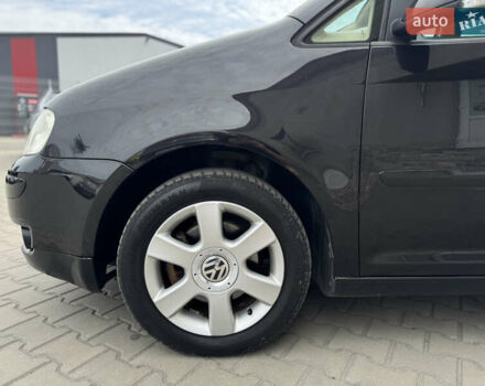Черный Фольксваген Туран, объемом двигателя 1.98 л и пробегом 188 тыс. км за 4600 $, фото 7 на Automoto.ua