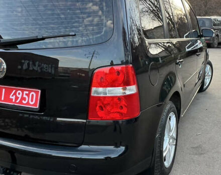 Черный Фольксваген Туран, объемом двигателя 1.6 л и пробегом 229 тыс. км за 6450 $, фото 10 на Automoto.ua